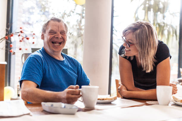 Adult Man Portrait with a Down Syndrome in a Daycare environment